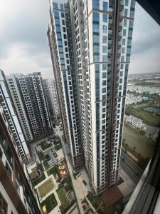 an aerial view of tall buildings in a city at Studio VIP Luxury Masteries OCP1 in Gia Lâm Pho
