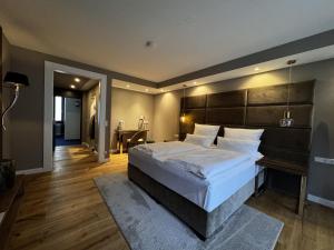 Postel nebo postele na pokoji v ubytování Hotel Luisenpark