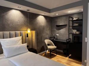 Postel nebo postele na pokoji v ubytování Hotel Luisenpark