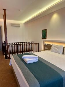 Llit o llits en una habitació de The Kumsal Hotel Oludeniz