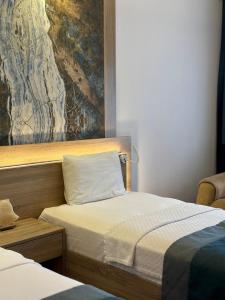 Llit o llits en una habitació de The Kumsal Hotel Oludeniz
