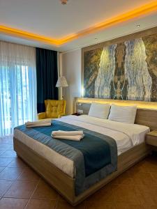 Llit o llits en una habitació de The Kumsal Hotel Oludeniz