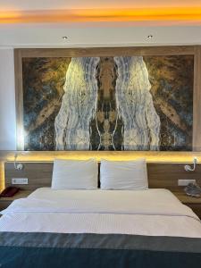 Llit o llits en una habitació de The Kumsal Hotel Oludeniz