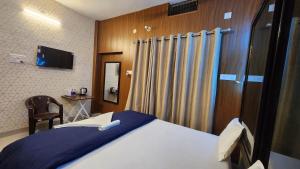 TV a/nebo společenská místnost v ubytování Kasha Homestay