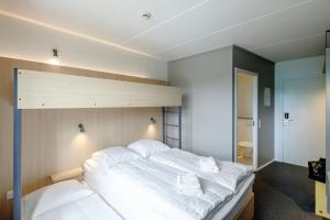 Postel nebo postele na pokoji v ubytování Four Points Flex by Sheraton Ballerup + 8 fotografií
