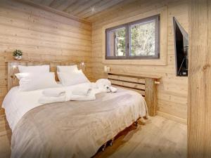 Ένα ή περισσότερα κρεβάτια σε δωμάτιο στο Chalet Charmar - OVO Network +19 φωτογραφίες