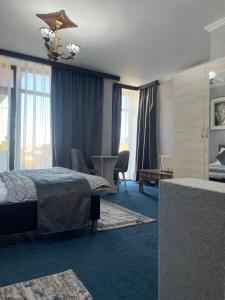 Ένα ή περισσότερα κρεβάτια σε δωμάτιο στο Zamco Boutique Hotel