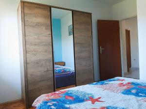 Ένα ή περισσότερα κρεβάτια σε δωμάτιο στο Apartment Denis