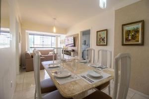 Un lugar para sentarse en BK64 - Próx Calçadão, 2 Dorm Climatizados