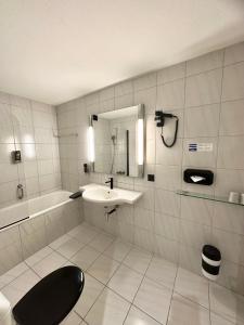 Koupelna v ubytování Hotel Baslertor
