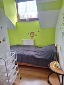 Postel nebo postele na pokoji v ubytování Fewo Ruhrblick com