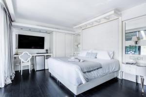 Postel nebo postele na pokoji v ubytování 1828 Smart Hotel Boutique