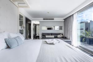 Postel nebo postele na pokoji v ubytování 1828 Smart Hotel Boutique
