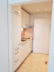 Η κουζίνα ή μικρή κουζίνα στο Modern Cosy Apartment in luxurious ambience