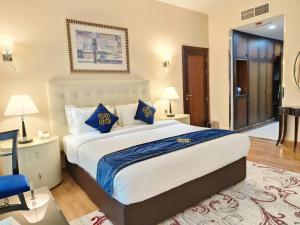 Letto o letti in una camera di Seven Seas Hotel