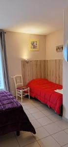 Voodi või voodid majutusasutuse Domaine de Meslay toas