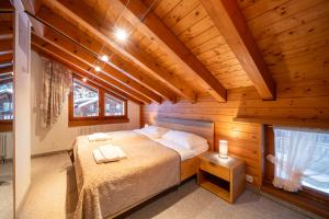 A bed or beds in a room at Hotel AMBiANCE