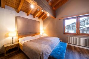 A bed or beds in a room at Hotel AMBiANCE