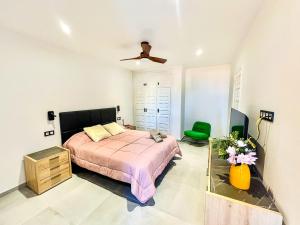 En eller flere senge i et værelse på Rentaliday Sweet Colon + 36 billeder