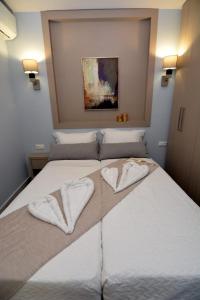 Ένα ή περισσότερα κρεβάτια σε δωμάτιο στο Chic Living 4