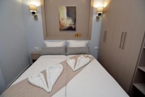 Ένα ή περισσότερα κρεβάτια σε δωμάτιο στο Chic Living 4