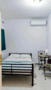 Tempat tidur dalam kamar di Le 3 isole
