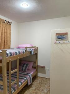 Postel nebo postele na pokoji v ubytování Hermosa Posada Lengerke!