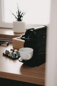 Set per la preparazione di tè e caffè presso DOM Apartment II - modern & zentral mit kostenfreiem Parkplatz