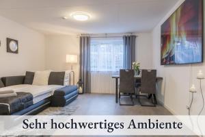 Posezení v ubytování RelaxApartment 15 Massagesessel SmartTV Küche