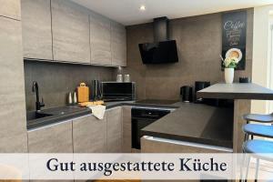 Kuchyň nebo kuchyňský kout v ubytování Relax Apartment Lakewalk + 8 fotografií
