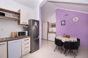 Kuchyň nebo kuchyňský kout v ubytování Apartment Ninić