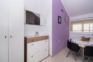 TV a/nebo společenská místnost v ubytování Apartment Ninić