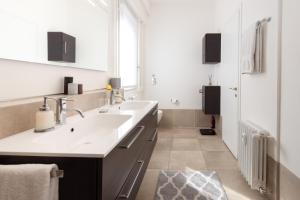 A kitchen or kitchenette at Spiga Duplex Suites by Montenapoleone Living