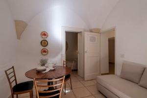 A seating area at Corte dei Romiti Apartment - Lecce Selection