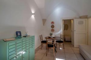 A seating area at Corte dei Romiti Apartment - Lecce Selection