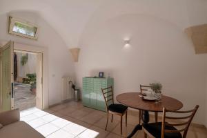 A seating area at Corte dei Romiti Apartment - Lecce Selection