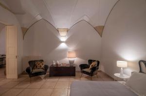 A seating area at Corte dei Romiti Apartment - Lecce Selection