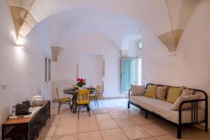 A seating area at Corte dei Romiti Apartment - Lecce Selection