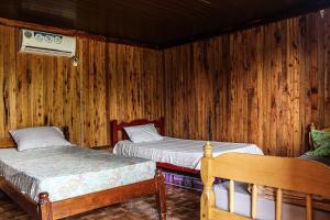 Postel nebo postele na pokoji v ubytování Rincón Coratei