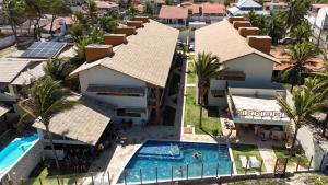 an aerial view of a resort with a swimming pool at Pousada Recanto dos Arrecifes in Nísia Floresta