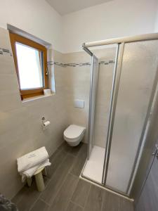 Koupelna v ubytování Hotel Camoscio