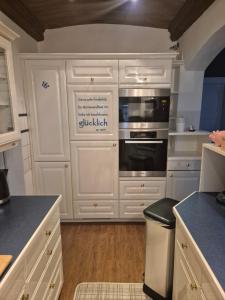 Kuchyň nebo kuchyňský kout v ubytování Ferienwohnung Meyer