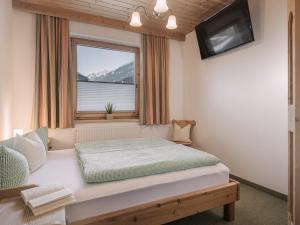 Postel nebo postele na pokoji v ubytování Appartement Geisler