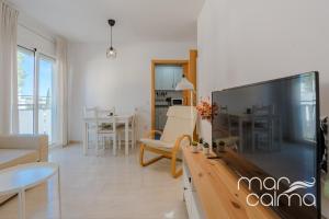 Televisyen dan/atau pusat hiburan di Apartment Francàs Zen by MarCalma