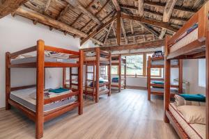Un pat suprapus sau paturi suprapuse la Casa de montaña - A Palleira do Curralón