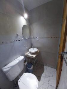 Koupelna v ubytování Complejo GARUPÁ