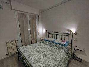 Posteľ alebo postele v izbe v ubytovaní Il mio piccolo angolo di mare Viareggio