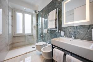 Koupelna v ubytování BH Hotel