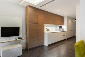 Kuchyňa alebo kuchynka v ubytovaní Cosmo Apartments Sants