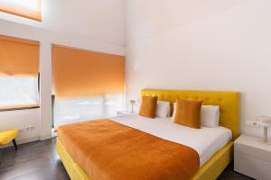 Posteľ alebo postele v izbe v ubytovaní Cosmo Apartments Sants